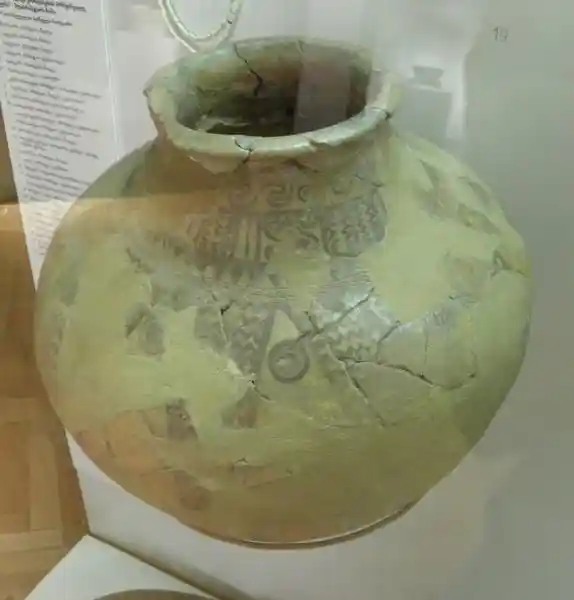 A solar disc with a solar symbol in the middle